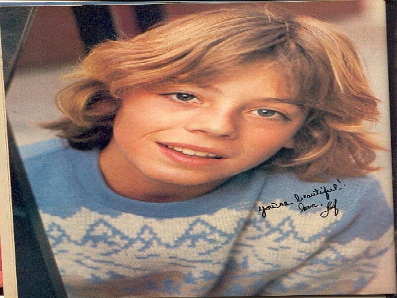 Young Boy with Blonde Hair — Blue