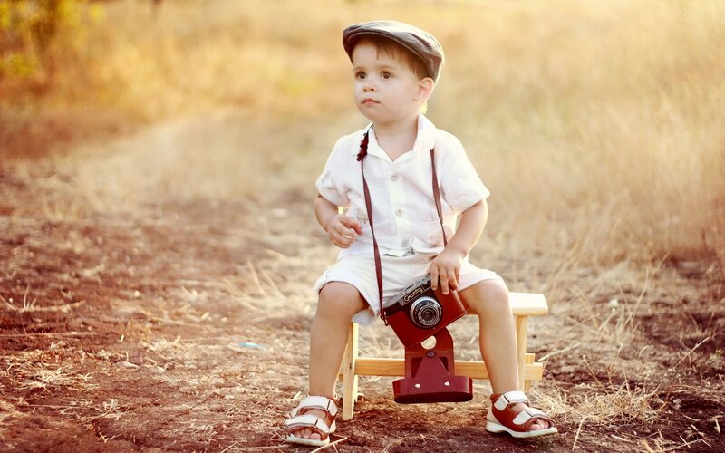 Young Boy with Camera
