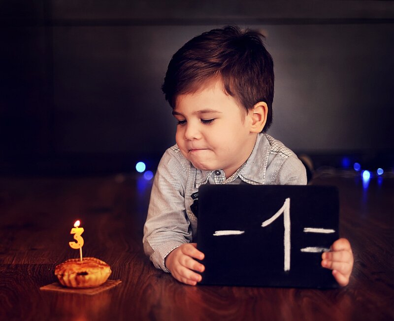Young Boy with Chalkboard