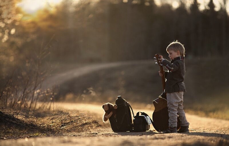 Young Boy with Guitar