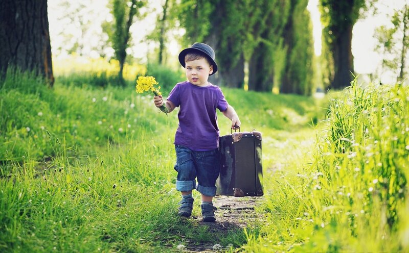 Young Boy with Suitcase