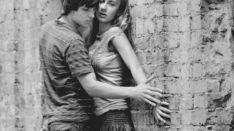 Young Couple Embracing — Black