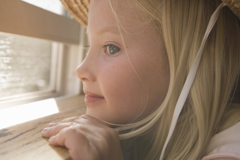 Young Girl at Window