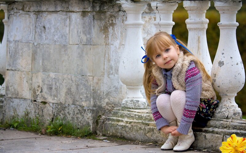 Young Girl Crouching