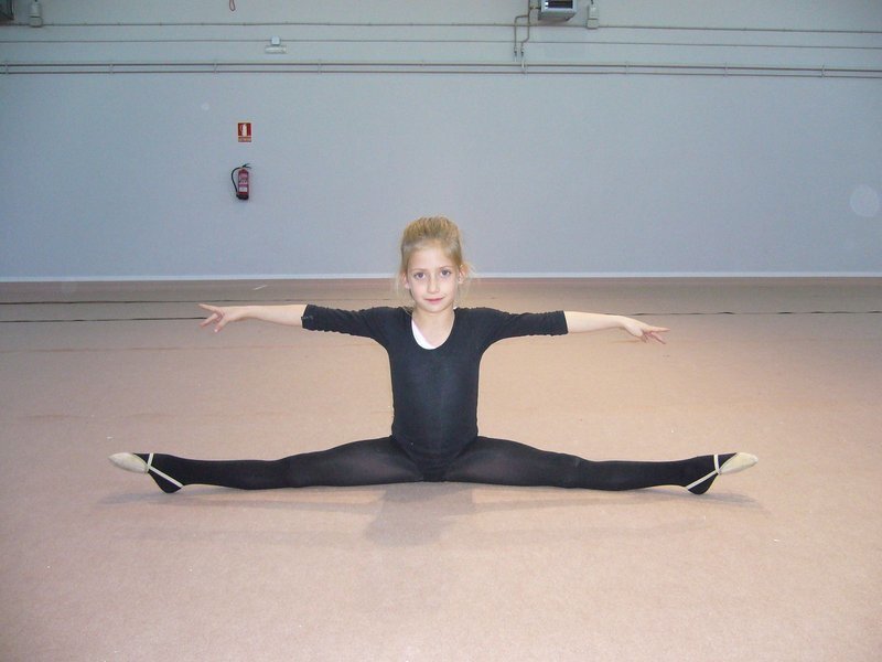 Young Girl Doing Split
