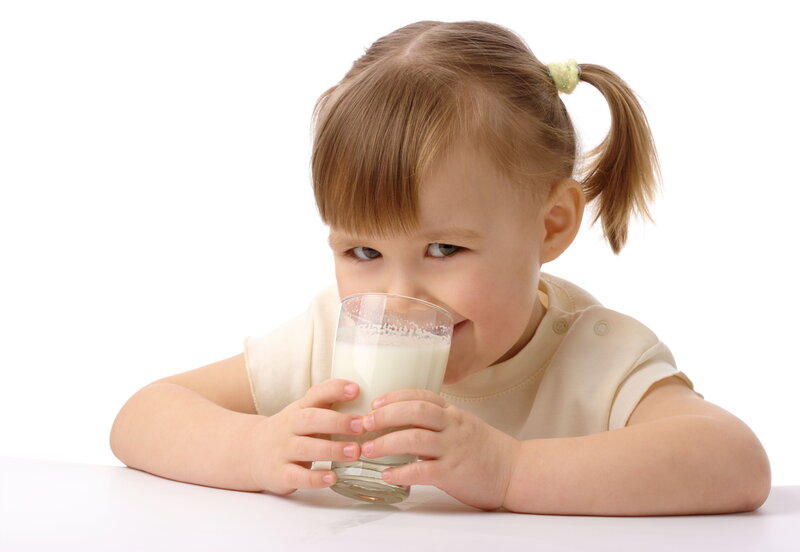 Young Girl Drinking Milk