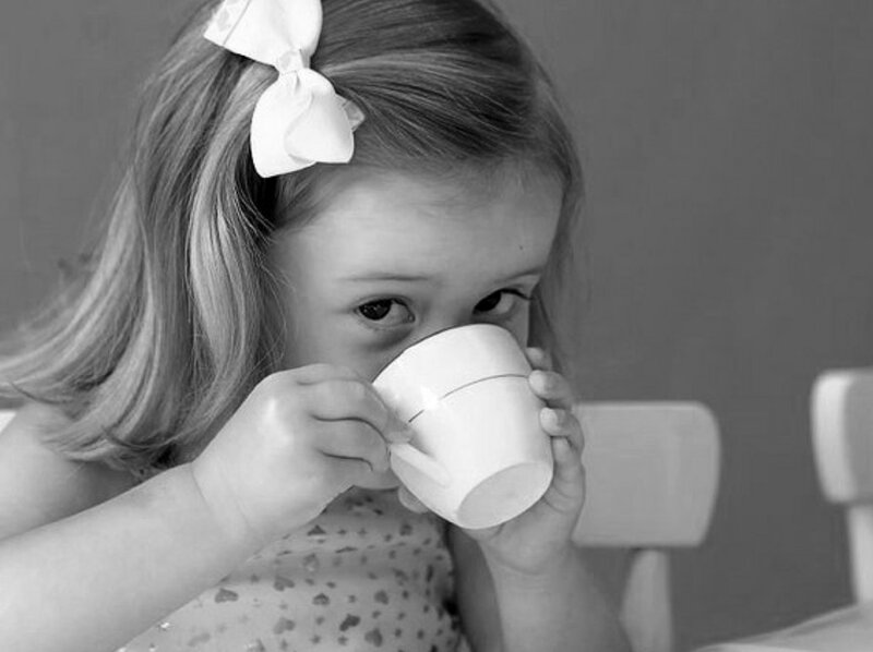 Young Girl Drinking Tea