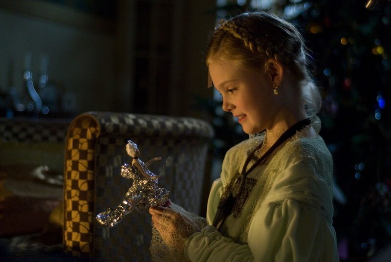 Young Girl Holding Doll