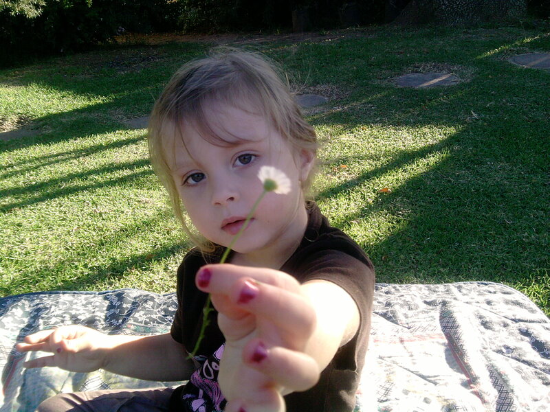 Young Girl Holding Flower — Green