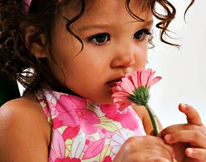 Young Girl Holding Flower — Pink