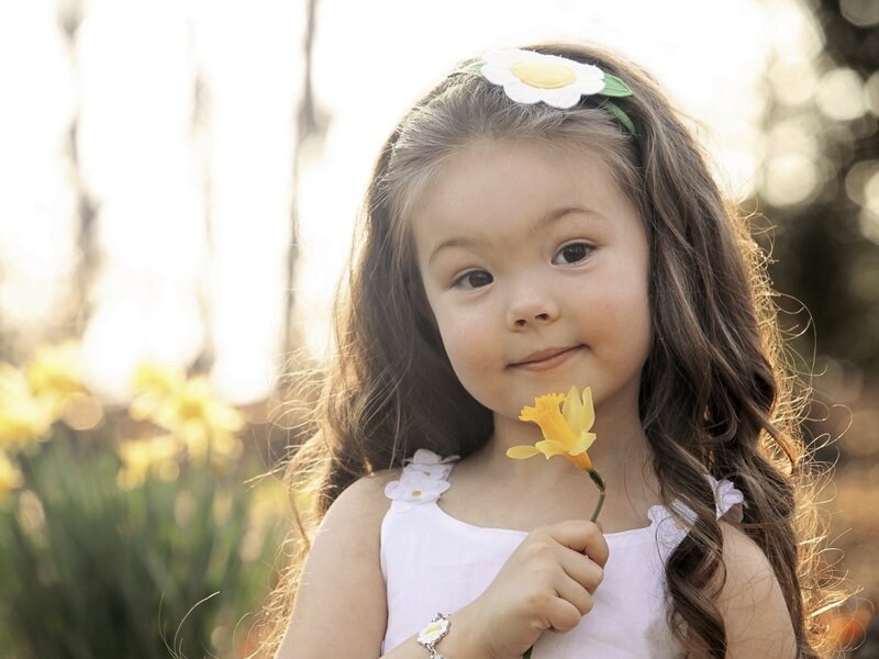 Young Girl Holding Flower — Yellow, Serene