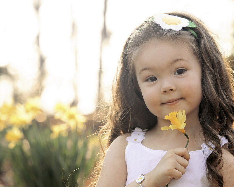 Young Girl Holding Flower — Yellow