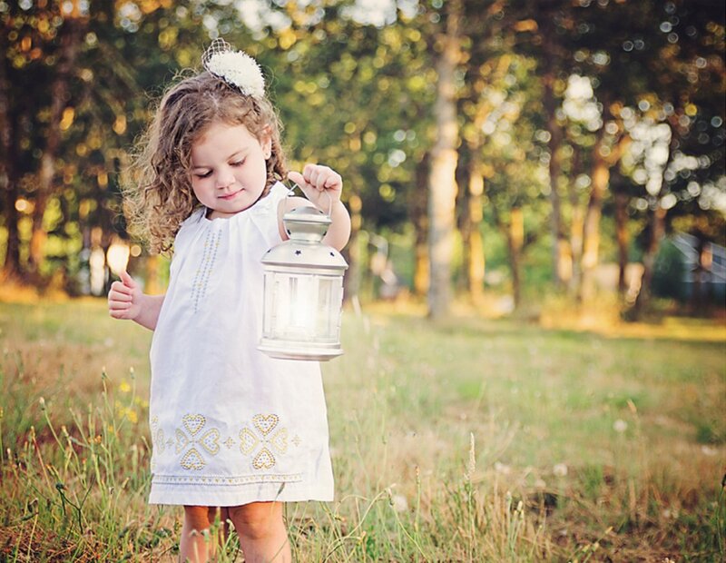 Young Girl Holding Lantern