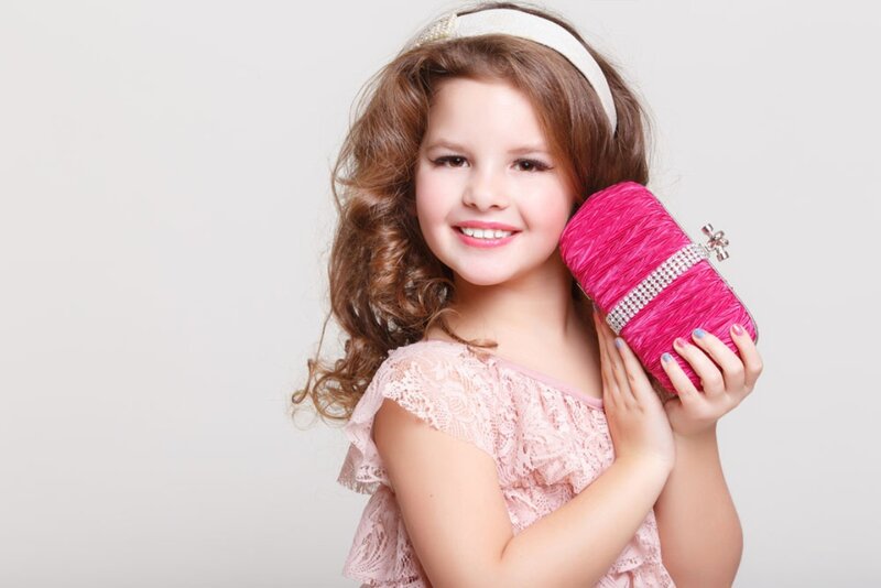 Young Girl Holding Purse