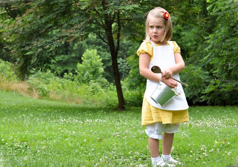 Young Girl in Apron