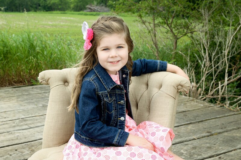 Young Girl in Chair — Pink