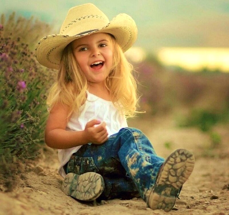 Young Girl in Cowboy Hat — Blue