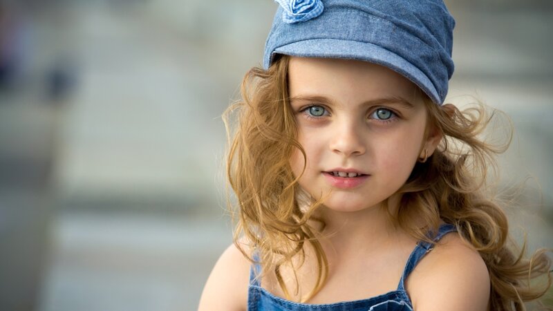 Young Girl in Denim Hat