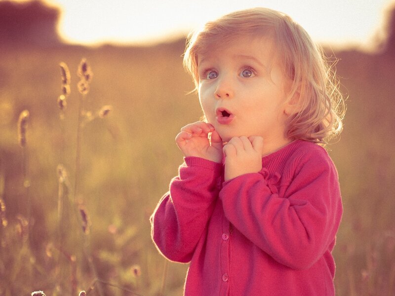 Young Girl in Field — Pink