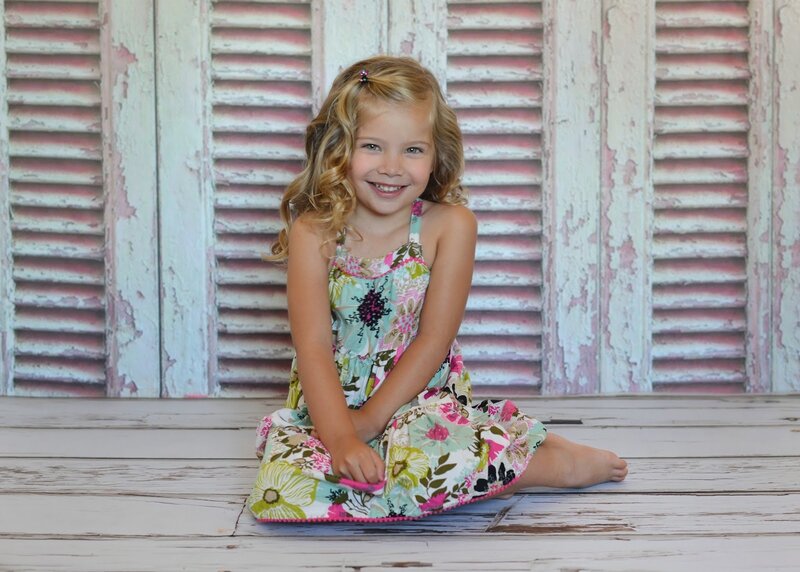 Young Girl in Floral Dress — White, Happy
