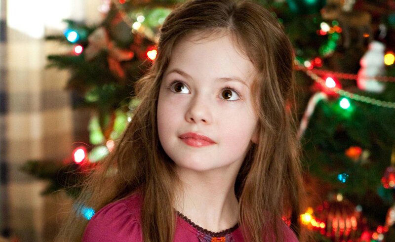 Young Girl in Front of Tree