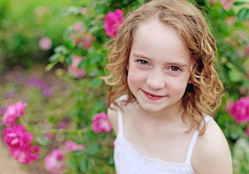 Young Girl in Garden — Pink