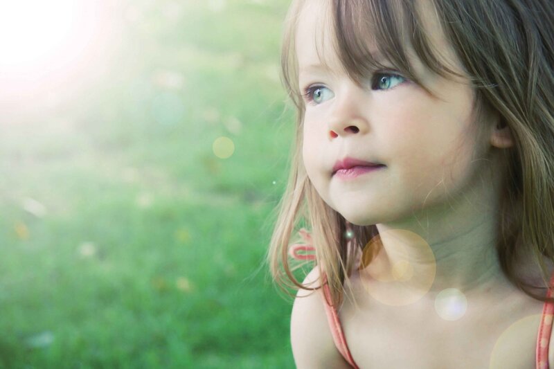 Young Girl in Grass — Green, Serene, Afternoon, Photograph