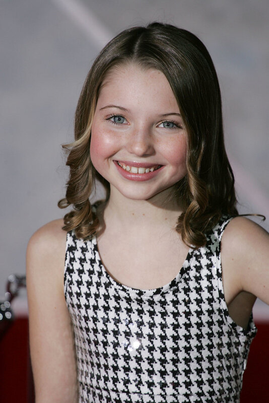 Young girl in houndstooth dress