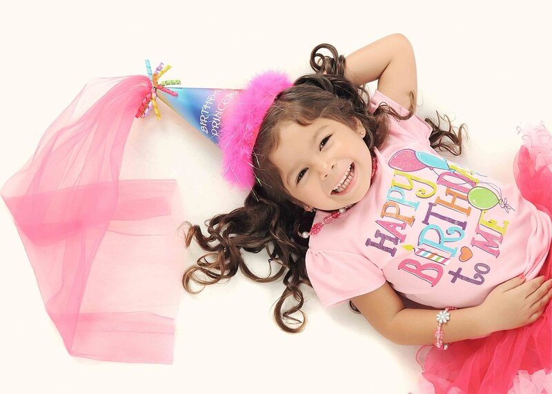 Young Girl in Party Hat