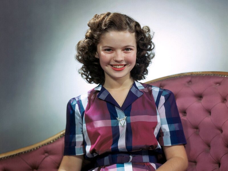 Young Girl in Plaid Dress