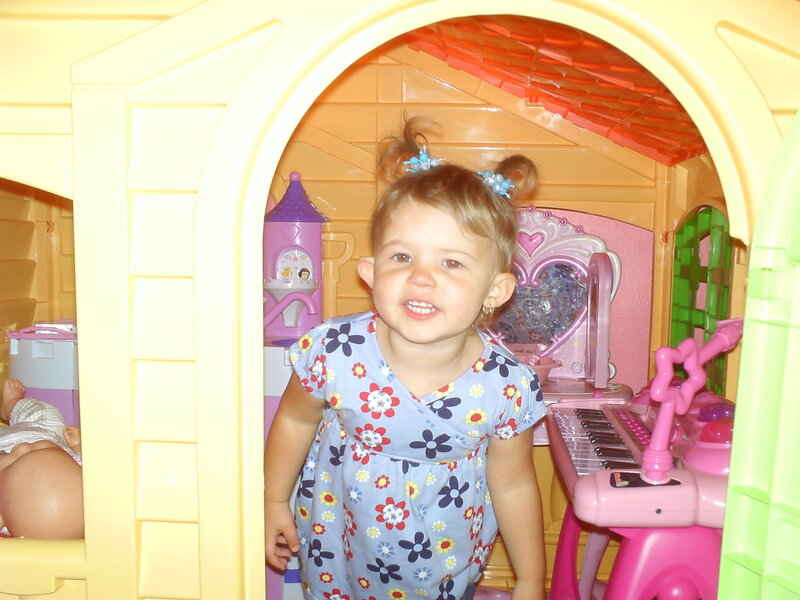 Young Girl in Playhouse