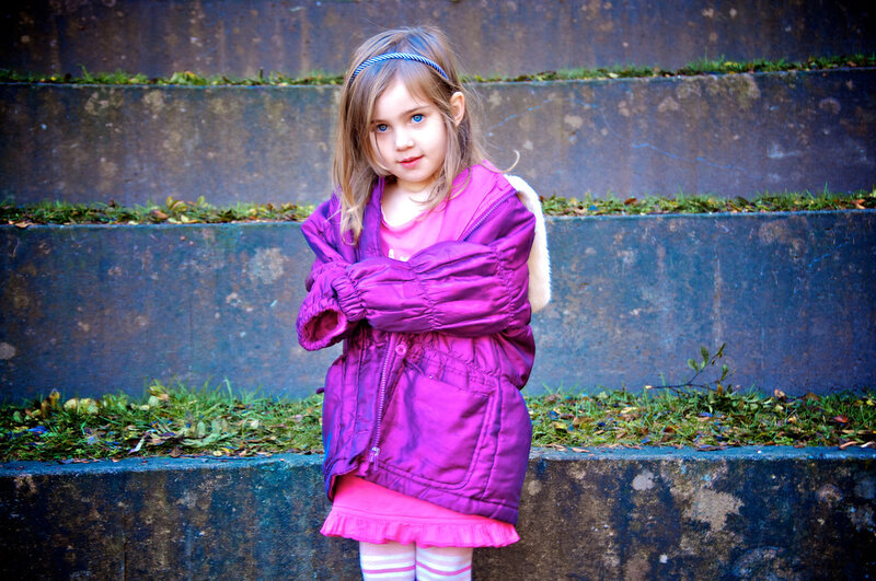 Young Girl in Purple Coat