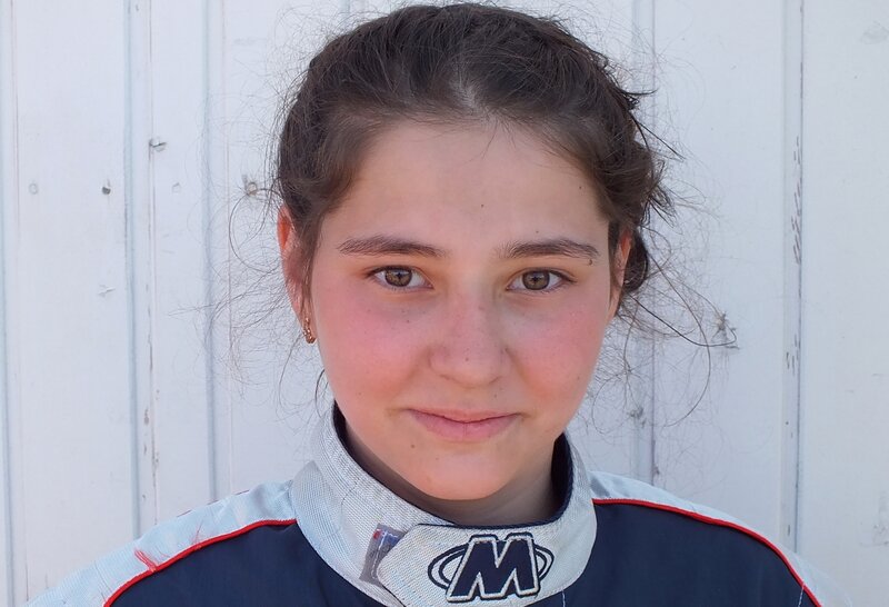 Young Girl in Racing Suit