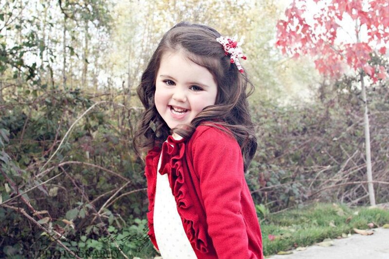Young Girl in Red Cardigan