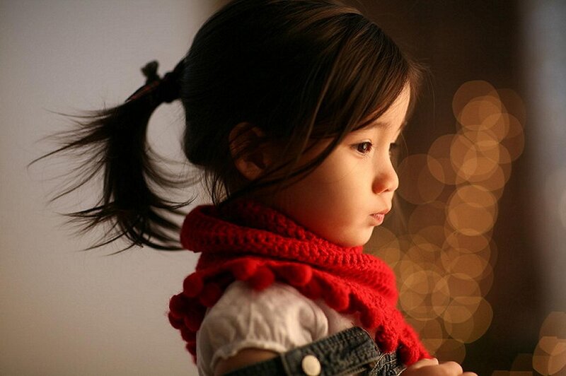 Young Girl in Red Scarf