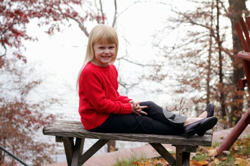 Young Girl in Red Sweater