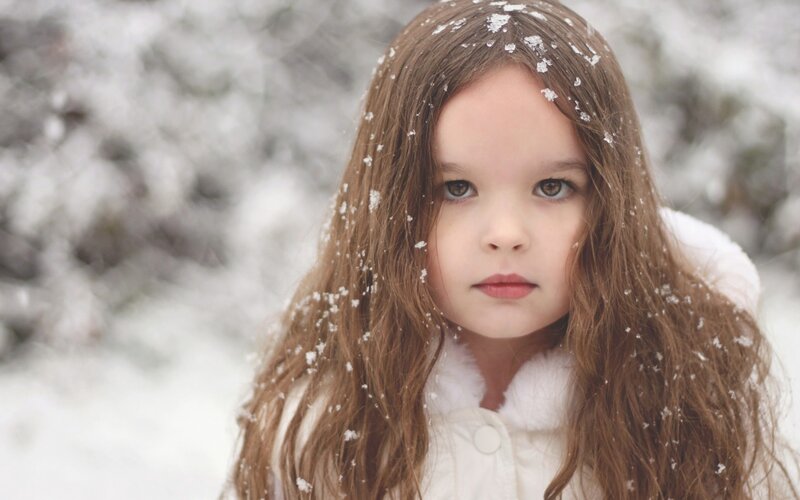 Young Girl in Snow