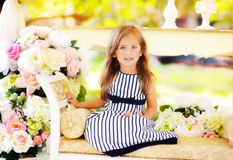 Young Girl in Striped Dress