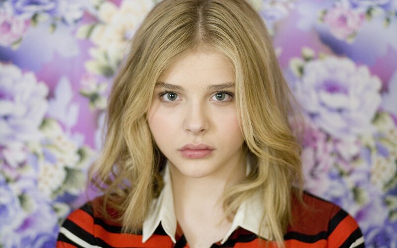 young girl in striped shirt