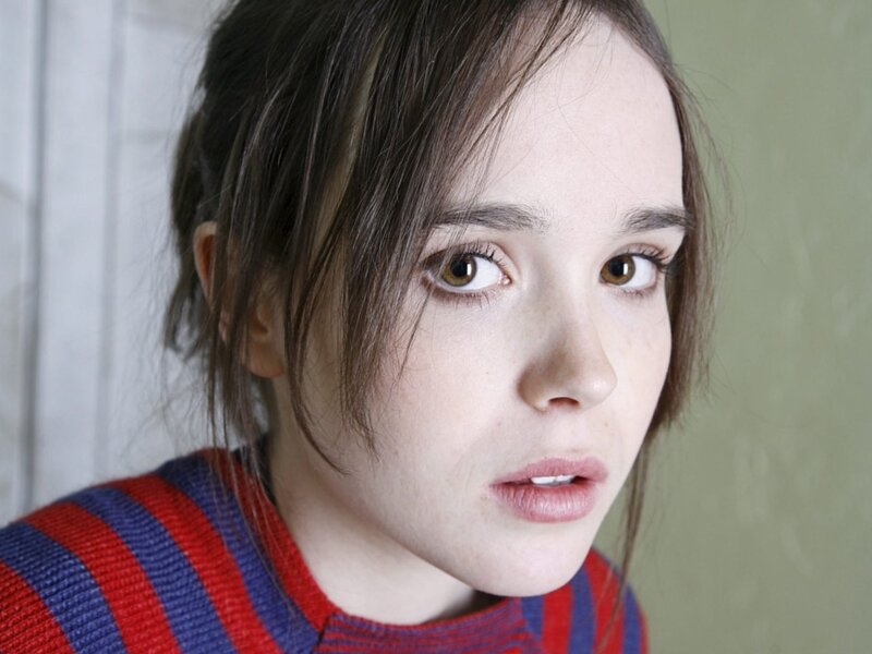young girl in striped sweater