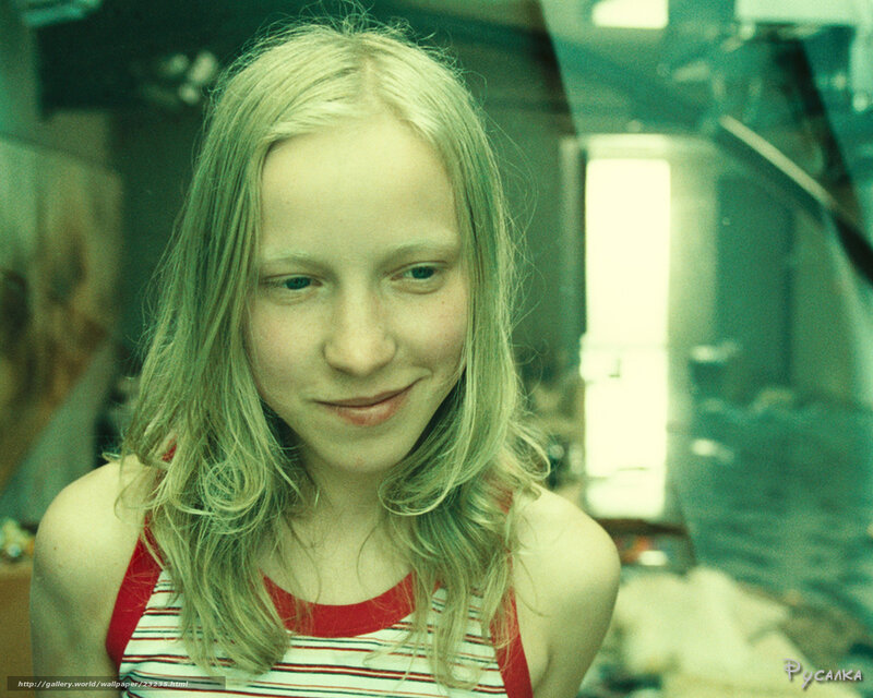 young girl in striped top