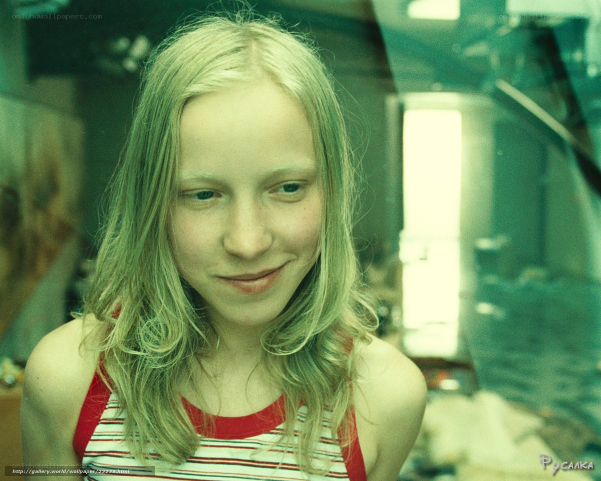 young girl in striped top