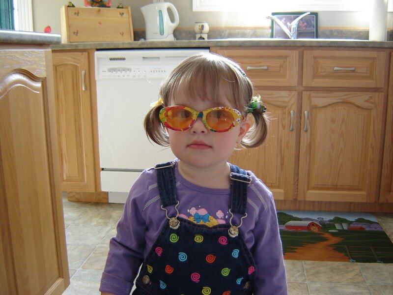 Young Girl in Sunglasses