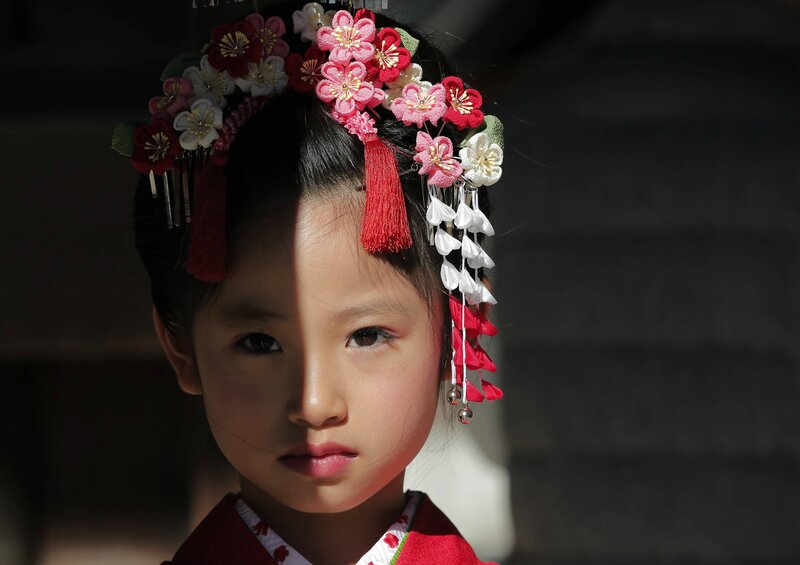 Young Girl in Traditional Attire — Red