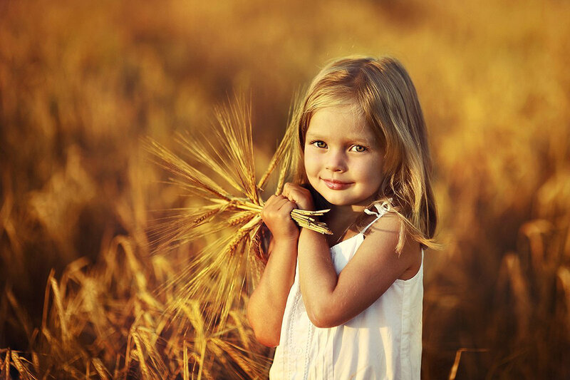 Young Girl in Wheat Field