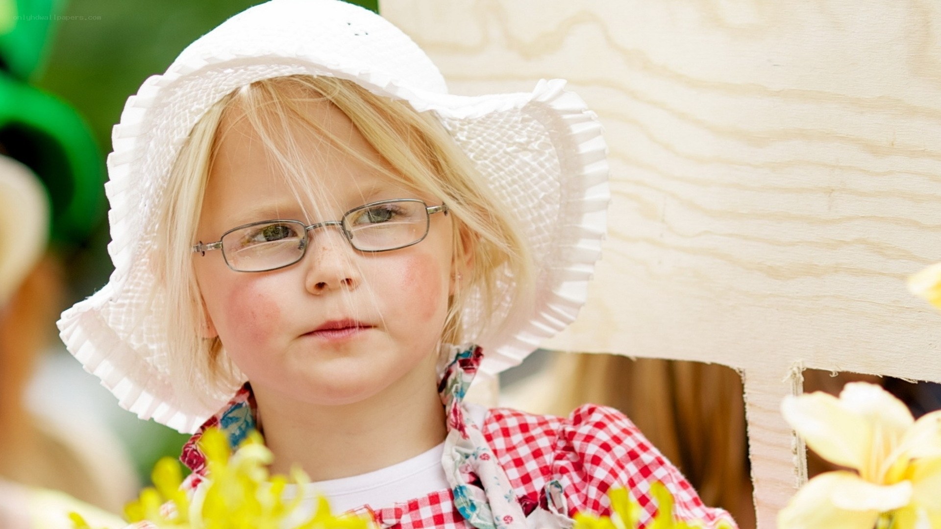 young girl in white hat