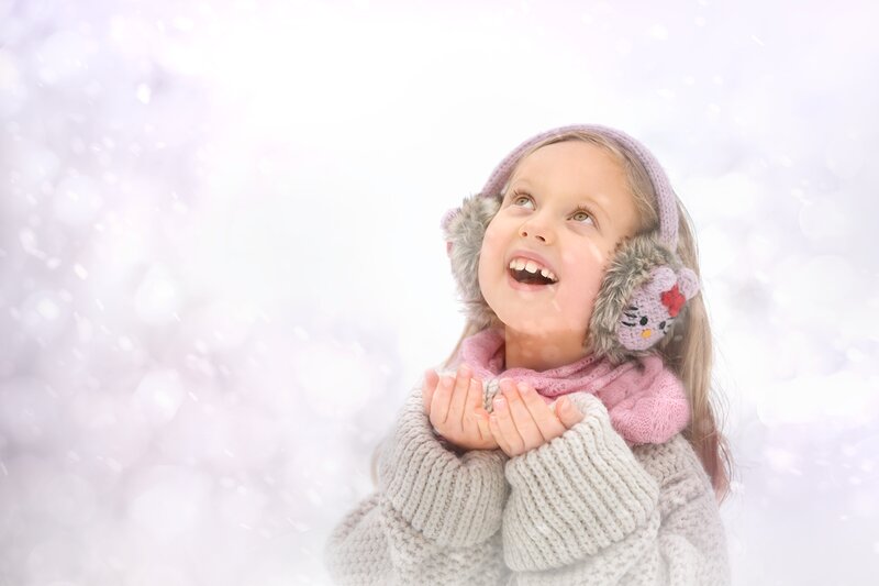 Young Girl in Winter Clothes — White, Joyful