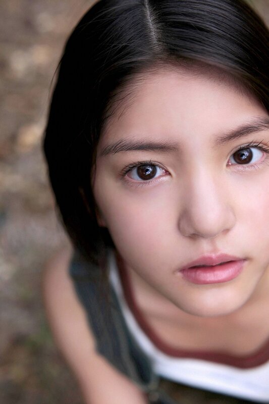 Young Girl Looking Up — Brown