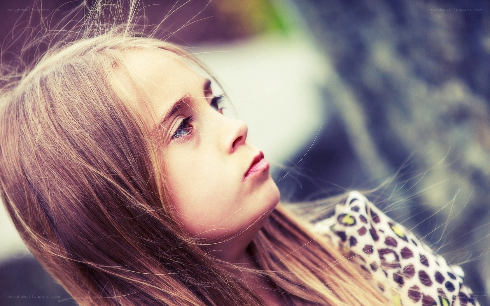 young girl looking up
