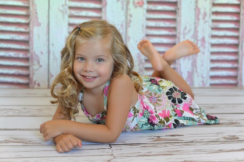 Young Girl Lying Down — Pink, Playful
